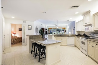 8565 Via Garibaldi Cir Unit 104, Estero, FL 33928