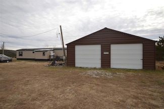 2040 Musser Rd, Mancelona, MI 49659