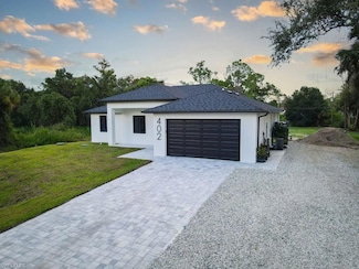 402 Thompson Ave, Lehigh Acres, FL 33972