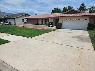 8040 Canterbury Cir, Seminole, FL 33777
