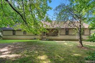 1500 Rustic Ln, Wolverine Lake, MI 48390
