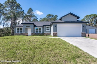 1398 Saxony Rd SW, Palm Bay, FL 32908