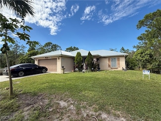 447 Jaguar Blvd, Lehigh Acres, FL 33974