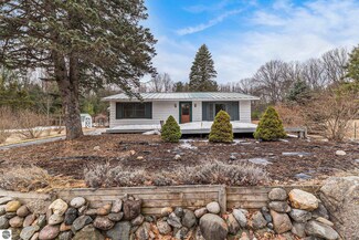 12060 SW Torch Lake Dr, Rapid City, MI 49676