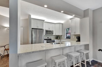 300 Uno Lago Dr Unit 101, Juno Beach, FL 33408