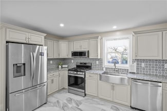 56 Center St, Woonsocket, RI 02895