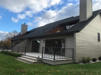 4000 Hemingway Pointe Club Rd Unit 56 and Boat Slip 28, East Jordan, MI 49727