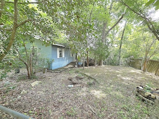 11519 Persimmon St, Willis, TX 77318