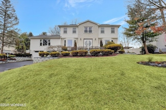 23 Country Oaks Dr, Manalapan, NJ 07726
