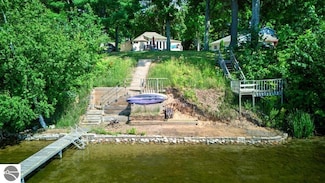 7600 Maple St, Grawn, MI 49637