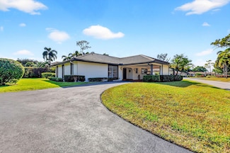 440 Pine Villa Dr, Lake Worth, FL 33462