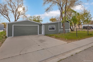 101 Larch Dr, Log Lane Village, CO 80705