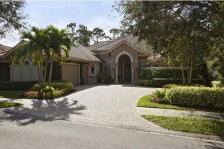 1075 Spanish Moss Trail, Naples, FL 34108