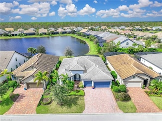 7544 Winding Cypress Dr, Naples, FL 34114