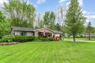 1037 W Marsh Rd, Sanford, MI 48657