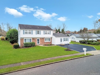 2 Tulip Grove Dr, Lake Grove, NY 11755