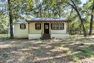 12295 S Bee Emet Rd, Milburn, OK 73450