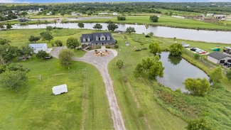 7902 S Redfish Dr, Hitchcock, TX 77563