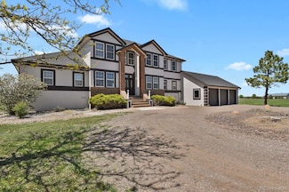897 E Rim Rd, Franktown, CO 80116
