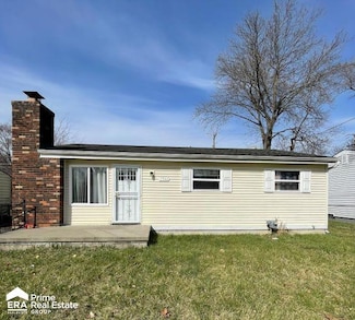 1346 Flamingo Dr, Mount Morris, MI 48458