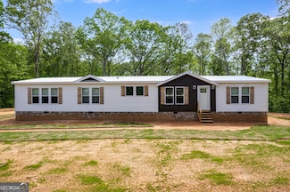 702 County Road 104, Muscadine, AL 36269
