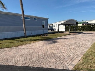 2445 Cypress St, Four Corners, FL 34714