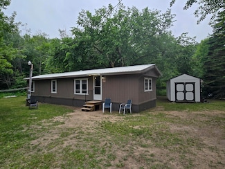 7698 Willowbrook Cir, Mancelona, MI 49659