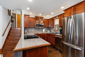 1742 Walter Dr, Grawn, MI 49637