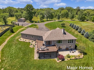 8298 Thornapple River Dr SE, Caledonia, MI 49316