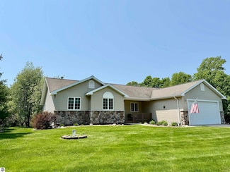 8673 Sun Bay Ct, Williamsburg, MI 49690