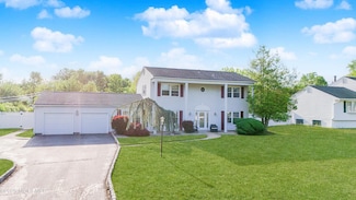 12 Lowell Rd, Manalapan, NJ 07726