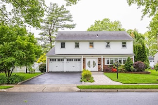 8 Marietta Dr, Westbury, NY 11590