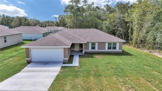 23211 Rainelle Rd, Rainbow Lakes Estates, FL 34431