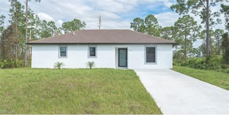 619 Summit Ave S, Lehigh Acres, FL 33974