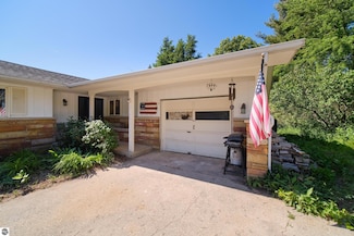 762 Eastman Rd, Beulah, MI 49617