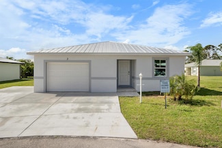 9 Don Quixote Ln, Port St. Lucie, FL 34952