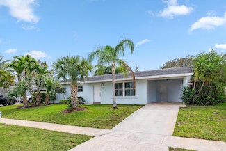 16 Ridgewood Cir, Jupiter, FL 33469