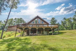 658 Mingo Loop Rd, Rangeley, ME 04970