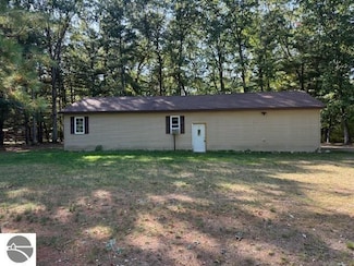 7861 N Bass Lake Rd, Irons, MI 49644