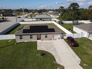 402 NE Mainsail St, Port St. Lucie, FL 34983