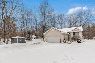 17110 Seneca Dr, Howard City, MI 49329