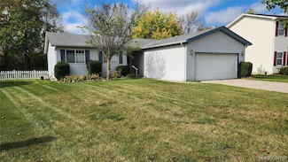 3088 Wild Orchid Ln, Burton, MI 48519