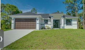 1147 Jean St E, Lehigh Acres, FL 33974