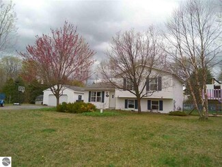 5684 Vance Rd, Grawn, MI 49637