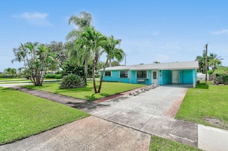 704 W Jasmine Dr, West Palm Beach, FL 33403
