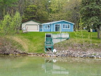 4037 N West Torch Lake Dr, Kewadin, MI 49648