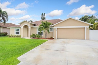 516 SW Crawfish Dr, Port Saint Lucie, FL 34953
