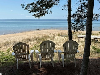 410 S Golden Beach Dr, Kewadin, MI 49648