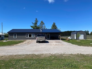 7557 Loop Rd, Posen, MI 49776