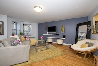 8 E 127th St Unit 1, New York, NY 10035